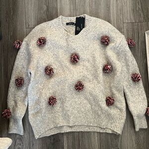 Zara grey sweater with colorful Pom poms.